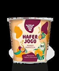 Mit der fruchtigen Sorte Mango Maracuja bringt dir der Haferjoghurt von The Vegan Cow ein Stück Sommer nach Hause.