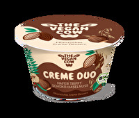 Was für ein Traum-Match! Nichts anderes ist das Creme Duo von The Vegan Cow, in dem ein auf Hafer basierendes Creme-Dessert auf Haselnuss und Schokolade trifft.