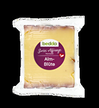 Der Swiss Affinage Almblüte Blöckli von bedda ist eine vegane Käsealternative, die nach Schweizer Affinage hergestellt wurde.