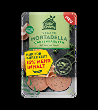 Die vegane Mortadella mit Kräutern +15% mehr Inhalt von Billie Green bringt frische Kräuternoten wie Schnittlauch und Petersilie auf den Frühstückstisch.