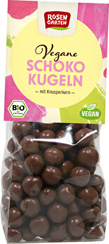 Die Schoko-Kugeln von Rosengarten sind herrlich knusprige Kugeln umhüllt von heller, veganer Schokolade.