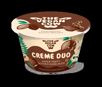 Was für ein Traum-Match! Nichts anderes ist das Creme Duo von The Vegan Cow, in dem ein auf Hafer basierendes Creme-Dessert auf Haselnuss und Schokolade trifft.
