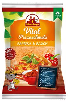 Der Pizzaschmelz Paprika & Rauch von Wilmersburger ist frei von Palm- und Kokosöl und schmilzt trotzdem wunderbar auf deinem Auflauf oder deiner Pizza.