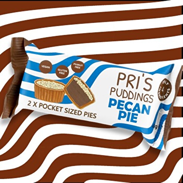 Die Pecan Pie von Pie's Puddings sind zwei Haferkekse in Törtchenform mit einer Füllung aus Datteln und einem leckeren Topping aus Pekannuss-Krümeln. Typisch englische Backtradition mit einem gewissen Etwas - perfekt für Genießer!