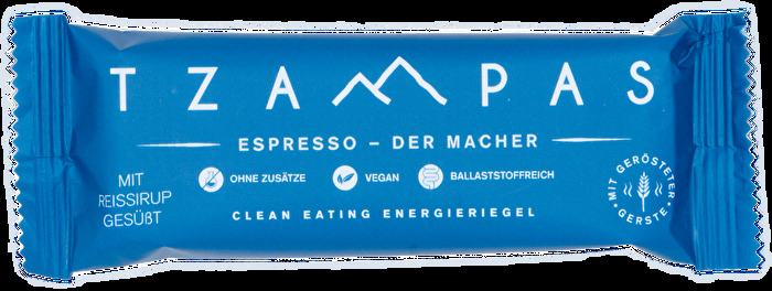 Der ESPRESSO Riegel von TZAMPAS versorgt dich mit einer extra Portion Energie dank enthaltener Espressobohnen.