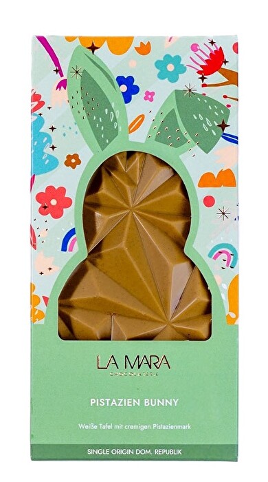 Pistazie Bunny von LA MARA Chocolaterie. Pistazie Bunny von LA MARA Chocolaterie vereint zartschmelzende weiße Schokolade mit einem cremigen Pistazienmark, das für einen nussigen, aromatischen Genuss sorgt.
