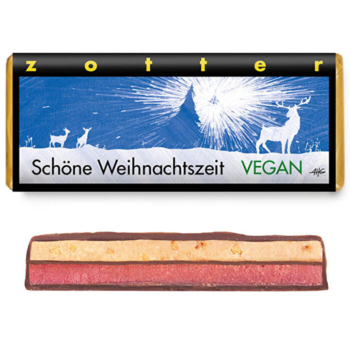 Die Schöne Weihnachtszeit Schokolade von Zotter hebt sich bereits durch die leuchtend pinke Farbe von den meisten anderen Schokoladen ab.