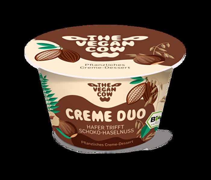 Was für ein Traum-Match! Nichts anderes ist das Creme Duo von The Vegan Cow, in dem ein auf Hafer basierendes Creme-Dessert auf Haselnuss und Schokolade trifft.